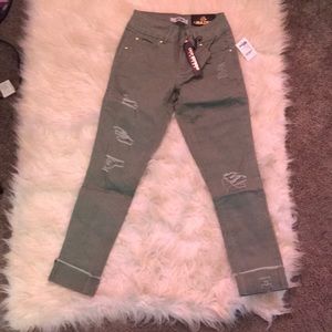 Olive green cropped boyfriend jeans with holes